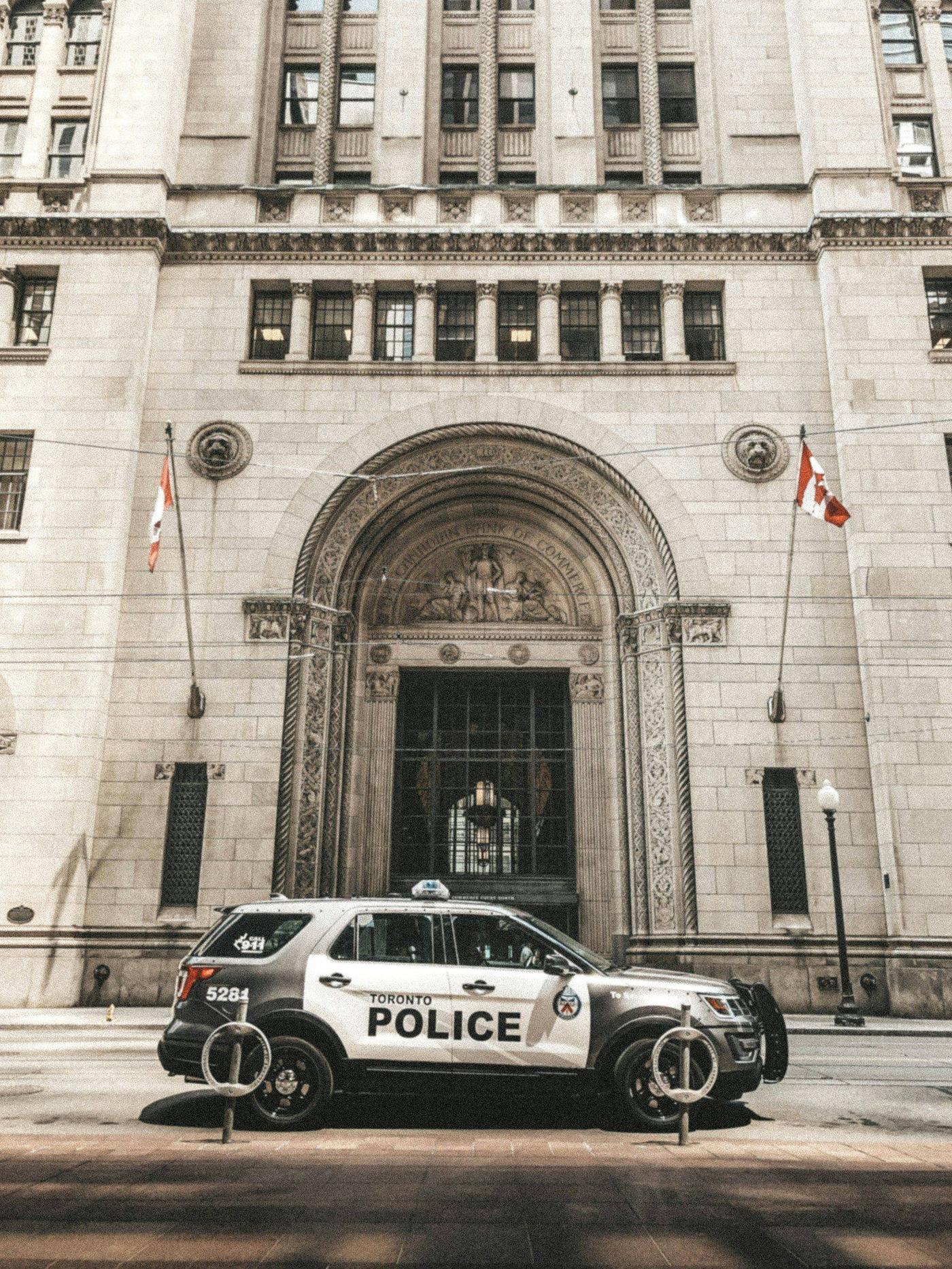Toronto Police cruiser outside the Toronto Police headquarters